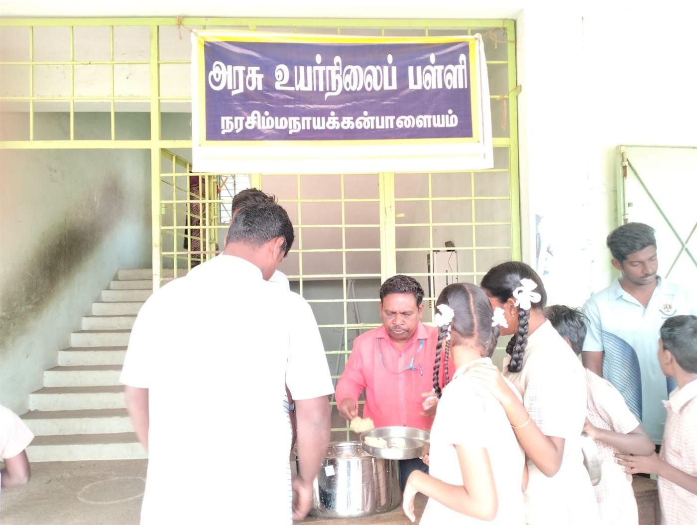Yaamie volunteers serving a community meal